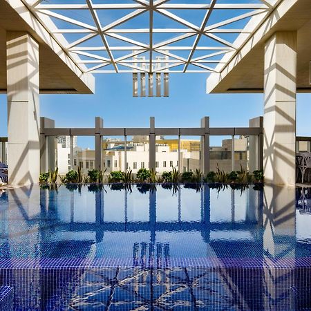 Millennium Place Ad-Dauha Zewnętrze zdjęcie The rooftop pool at the Four Seasons Hotel, Cairo