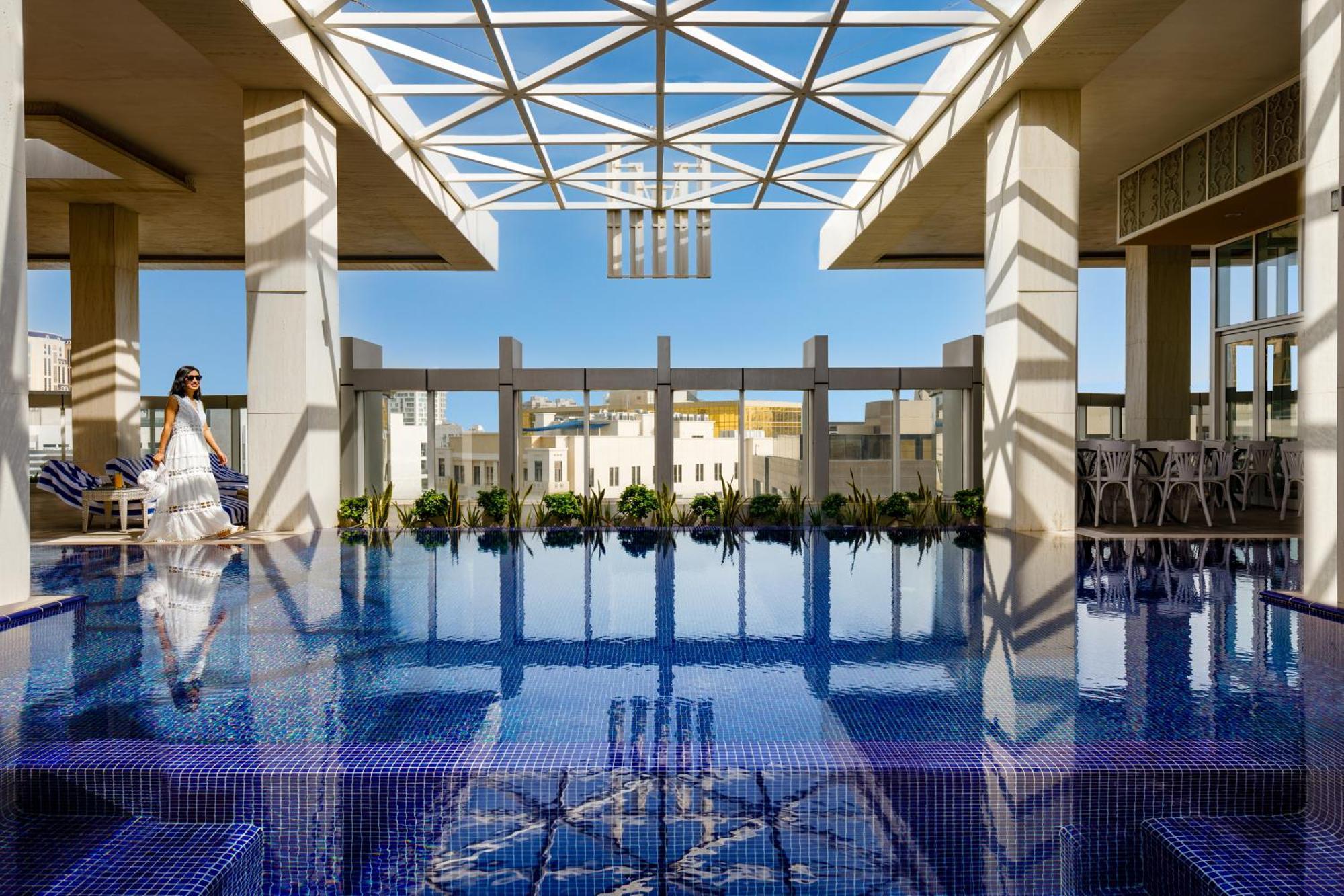 Millennium Place Ad-Dauha Zewnętrze zdjęcie The rooftop pool at the Four Seasons Hotel, Cairo